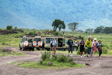 Ngorongoro Crater, Tanzania - March 12, 2023: Tourists walk around at a rest area while on safari at the Ngorongoro Craterのeditorial素材