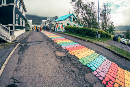 Seydisfjordur, Iceland - July 5, 2023: Rainbow road leading to the church in the small town of Seydisfjordur in East Icelandのeditorial素材
