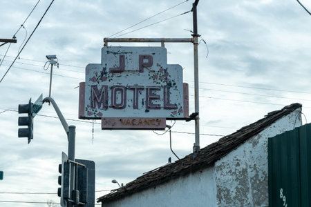 Globe, Arizona - December 19, 2023: JR Motel, rustic and rusted neon signのeditorial素材