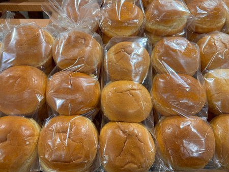 Packaged buns and rolls for sale at a grocery store