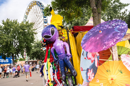 St. Paul, Minnesota - August 26, 2023: Vendor selling novelty fun toys for kids, including a blow-up...
