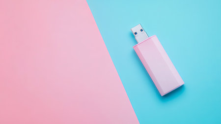Usb flash drive on blue and pink background. Top view.の素材