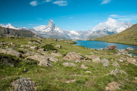Beautiful Stellisee Lake with a Matterhorn reflection - Five Lakes Trail in Zermatt, Switzerlandの写真素材