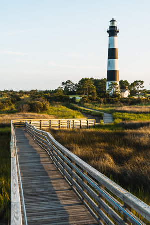 Bodie Island Lighthouse at dusk golden hour, Outer Banks, North Carolina.の写真素材