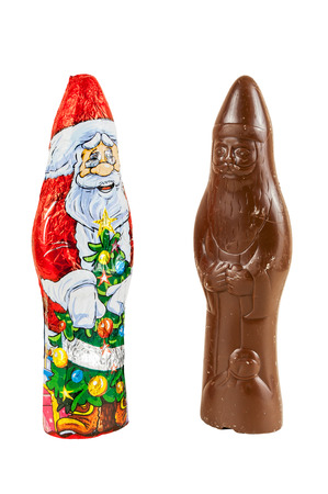 Chocolate figures of santa Claus isolated over white background with clipping path の写真素材