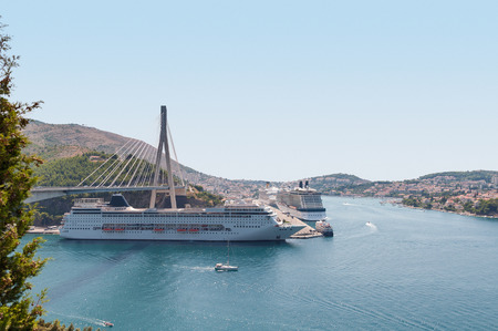 Cruise ships anchored in croatian port of Dubrovnikの写真素材