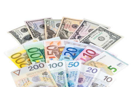 Dollar euro and polish zloty banknotes isolated on white background with clipping pathの写真素材