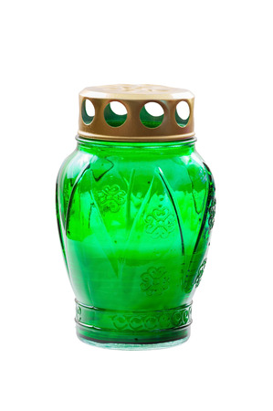 Green votive candle isolated on white backgroundの写真素材