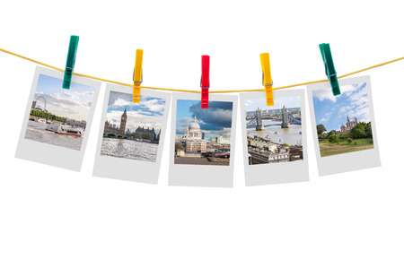 Five photos of London on clothesline isolated on white backgroundの写真素材