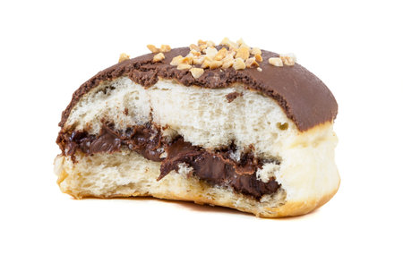 Partially eaten chocolate donut isolated on white background