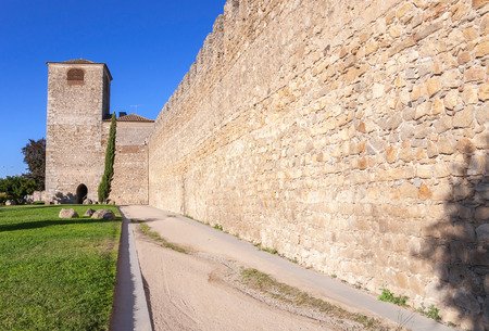 The ancient city walls of Evora in Portugalの写真素材