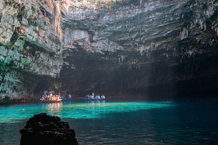 Cephalonia, Greece - August 30, 2015: Tourists take a boat trip on the beautiful Melissani Lake.のeditorial素材