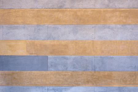 Texture or background made of blue and orange bricksの写真素材