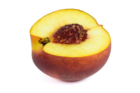 Half of peach isolated on white background with clipping pathの写真素材