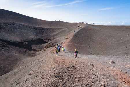 Etna, Sicily, Italy - August 21, 2017: Tourists admire the view on the Barbagallo crater on Mount Etnaのeditorial素材