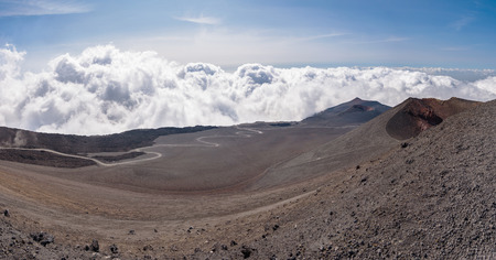 Lunar landscape of the Mount Etna with road on the lava field , Sicily, Italyの写真素材