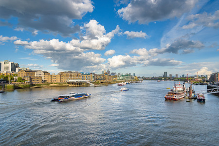 Boats on River Thames in London, United Kingdomの写真素材