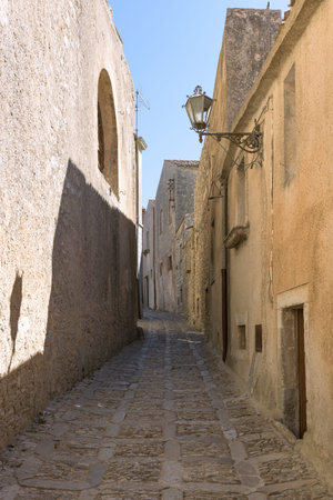 Narrow street of the famous ancient town Erice, Sicily, Sicilyの写真素材