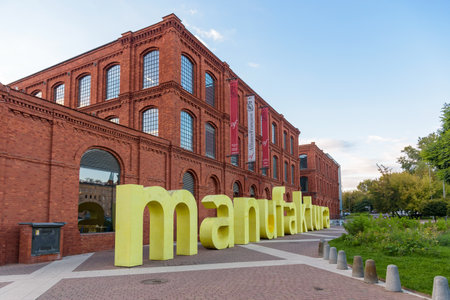 Lodz, Poland - 29 September, 2022: Sign at the inner square of Manufaktura, an arts centre, shopping mall, and leisure complexのeditorial素材