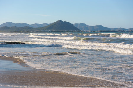 Wavy Mediterranean sea at northern Majorca coast in Can Picafort. Balearic Islands, Spainの写真素材