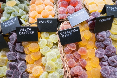 Baskets full of flavorful jellies in a marketの写真素材
