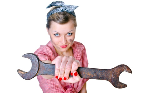 girl with spanner isolated on white backgroundの写真素材