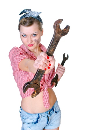 girl with spanner isolated on white backgroundの写真素材