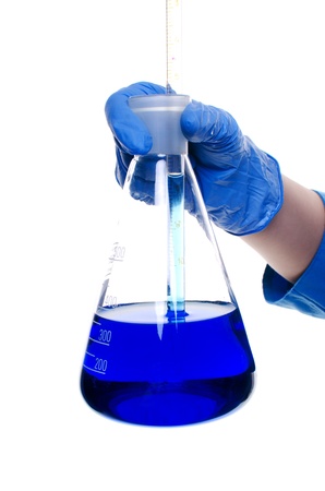 flask with blue liquid on white backgroundの写真素材
