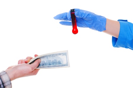 exchange of money for medicine in the red tubeの写真素材