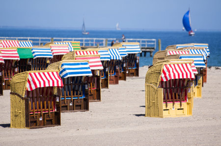 chairs at the sandy beachの写真素材