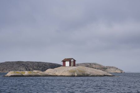 House on rock in archipelagoの写真素材