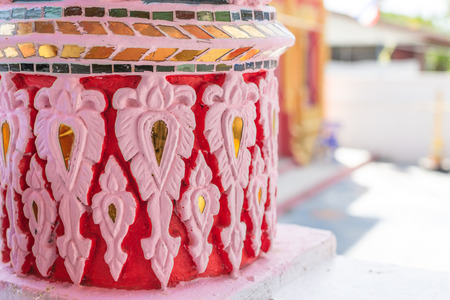 Striped pillar at buddhist sanctuary public domain in the temple of thailandの写真素材
