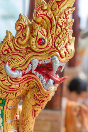 Thai dragon lai thai golden naga in public location san kamphaeng temple in thailandの写真素材