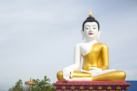 White body and golden buddha statue in san khampaeng chiangmai temple public location of thailandの写真素材