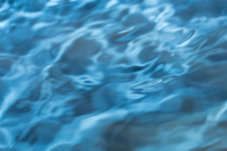 Water drop and bubble as bokeh backgroundの写真素材