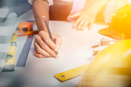 Picture of architect engineer start-up drawing architectural building blueprint project, business...