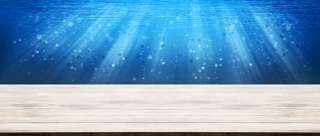 Panorama wooden tabletop with deep sea underwater ocean with water bubbles glitter effect for montage your product.の写真素材