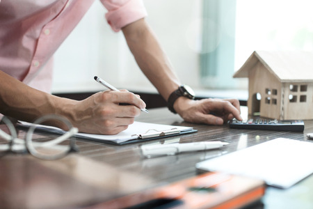 Financial banker person working finances and economy concept.の写真素材