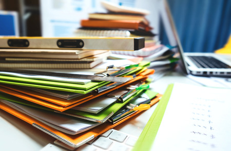 Property engineering contractor working desk tablet with wood house model and business object and equipment a lot of things.の写真素材