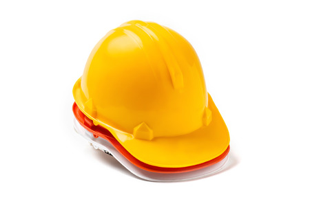 Red, yellow, white engineer hat work safety on white background.の写真素材