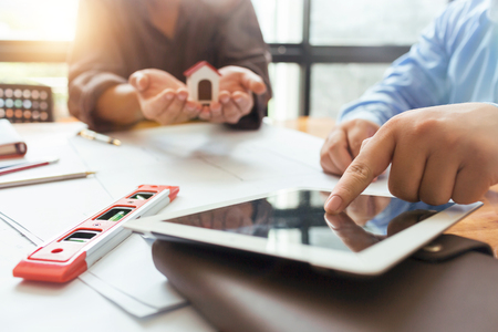 Construction engineering meeting at workplace office working hard modern design new plan on their project architecture concept.の写真素材