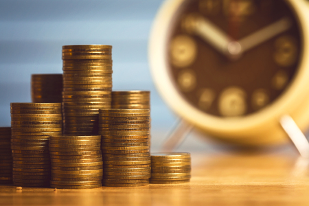 Saving money to buy a new home of its own money in the piggy bank. Lowest cost and tax.の写真素材