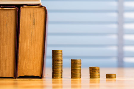 Saving money for education and loan for study concept in modern room wooden table.