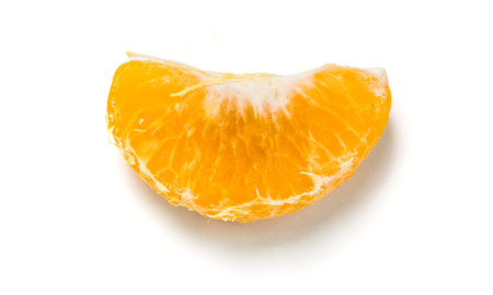 Top view orange fruit macro on white background.の写真素材