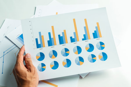 Close up hand of business man with financial report accounting analysis.