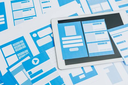 Developing wireframe UX/UI mobile application design for mobile user experience.の写真素材