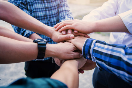 Business teamwork join hands together outdoor man.