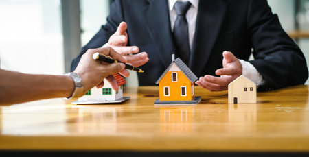 Buyers choose homes from real estate brokers, by pointing the pen to the model house.