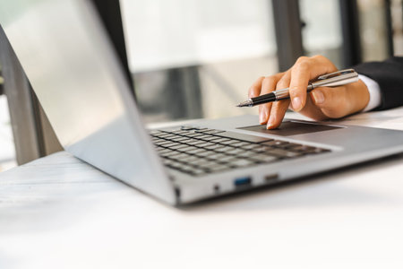 Professional investor working with laptop new start up project.