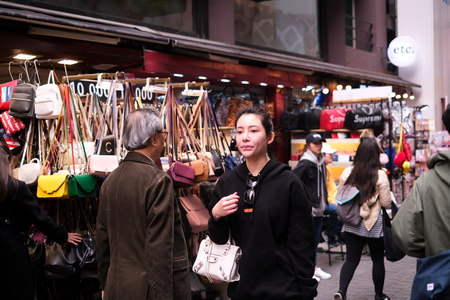 MYEONGDONG, SEOUL - 27th March 2019 : Pedestrians , locals, foreigners and tourist walking the the street of Myeongdong, one of Seoul most visited district.のeditorial素材